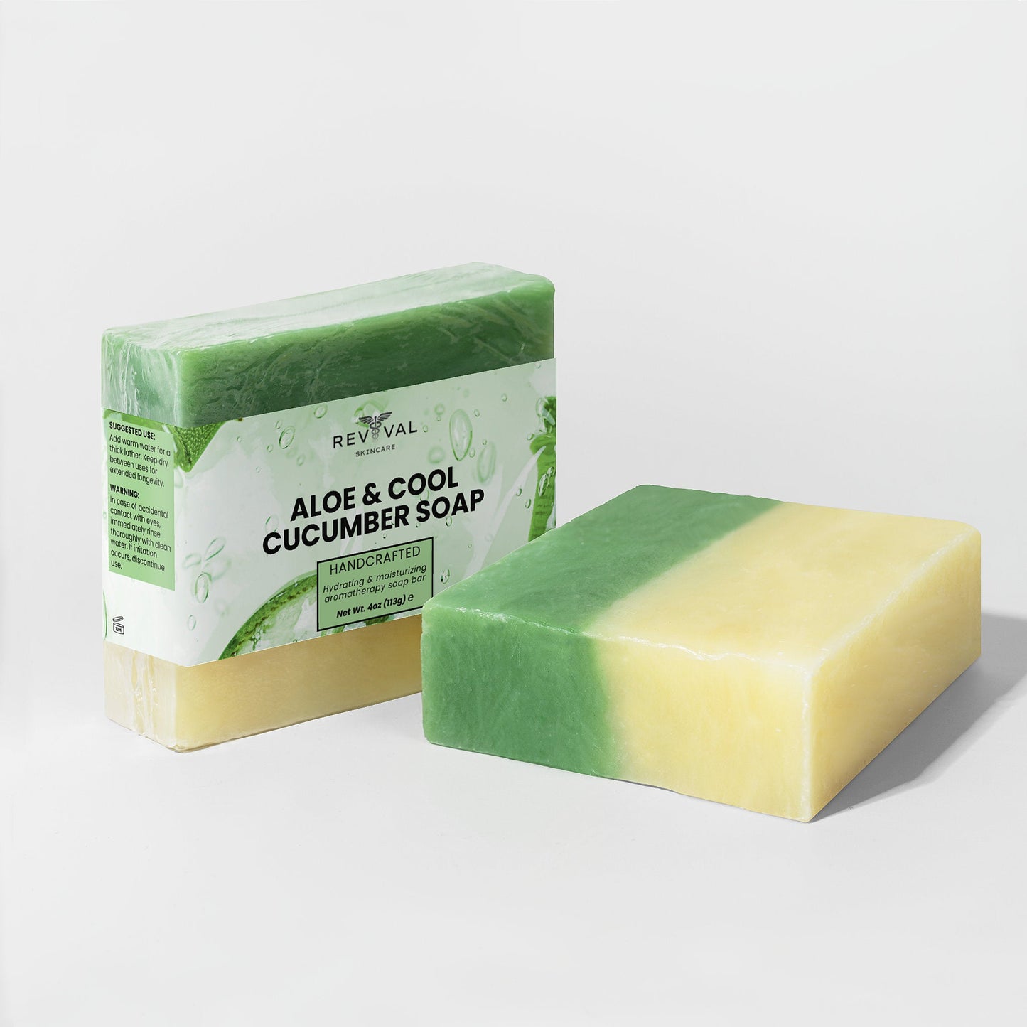 Green and yellow soap bar with packaging labeled 'Aloe & Cool Cucumber Soap' on a light gray background.