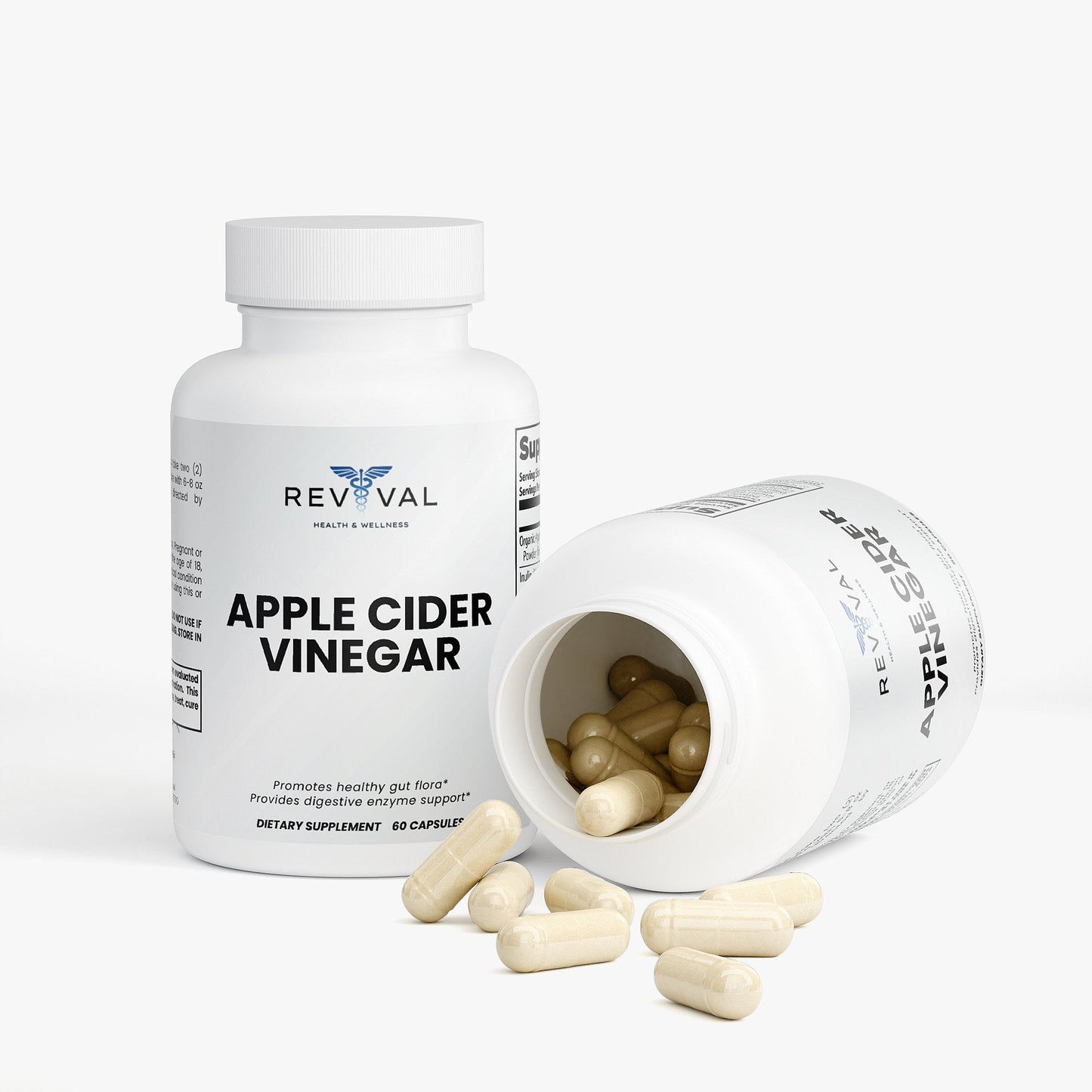 Revival Apple Cider Vinegar supplement bottle with open cap showing capsules on a white background