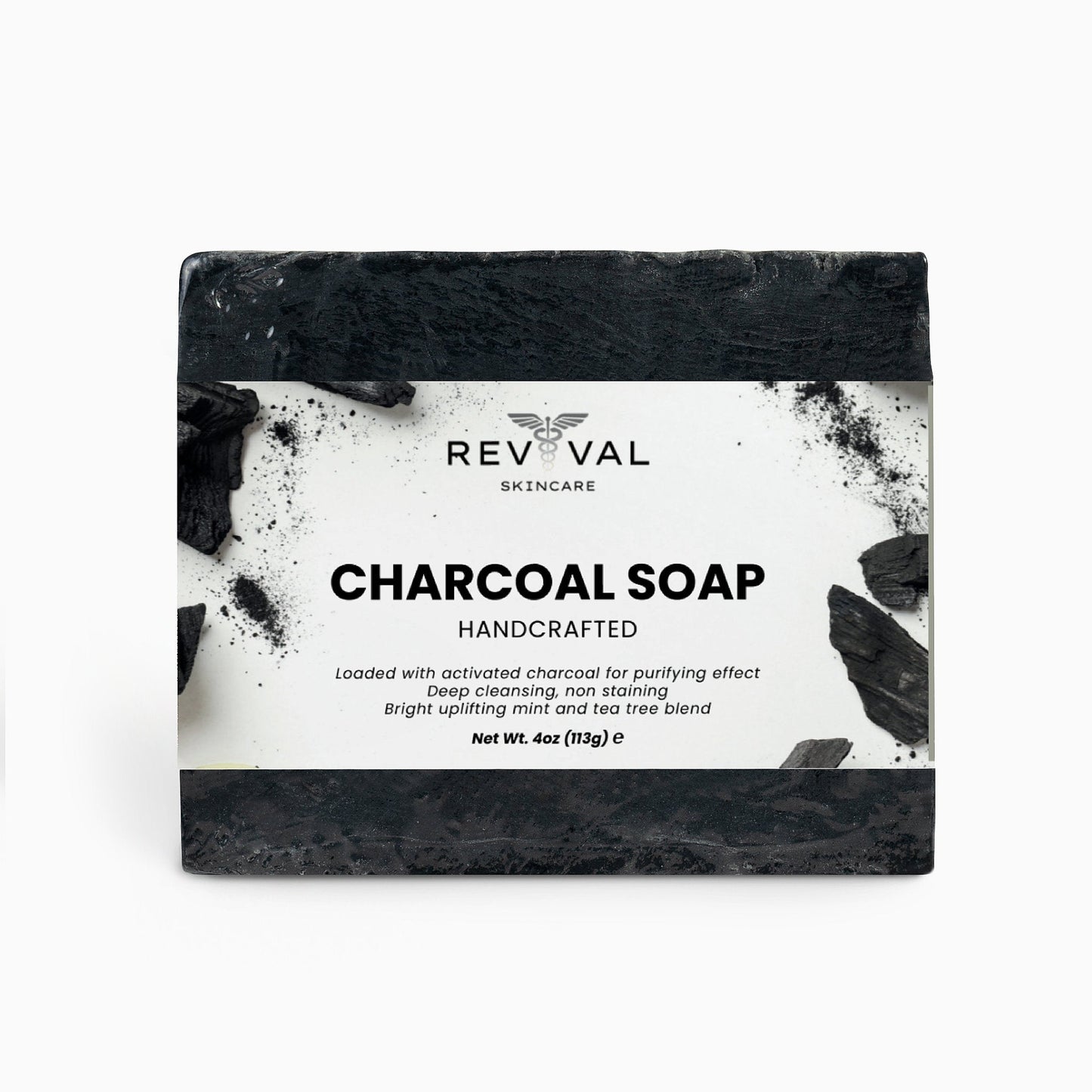 Revival Skincare charcoal soap bar on a white background