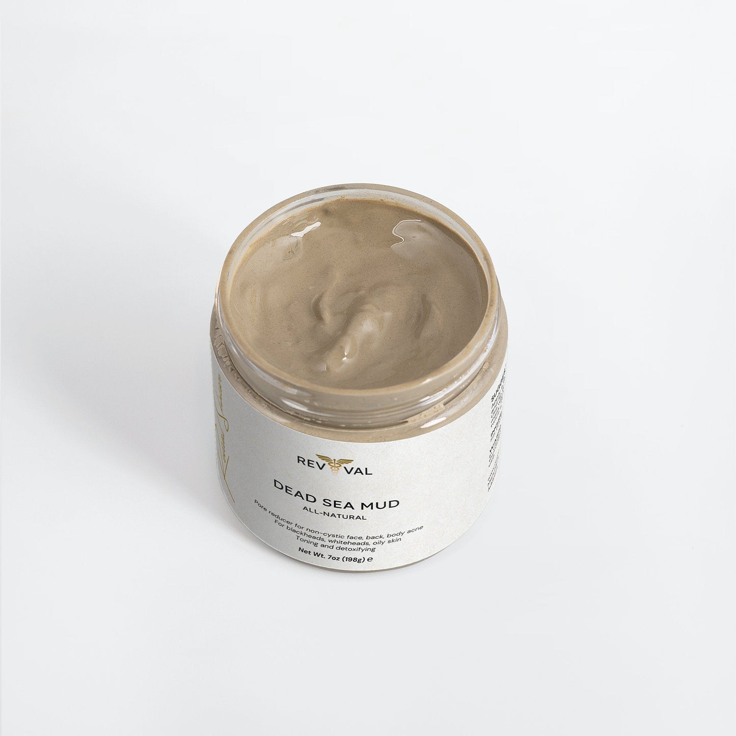 Jar of Dead Sea Mud with visible brand name on a white background