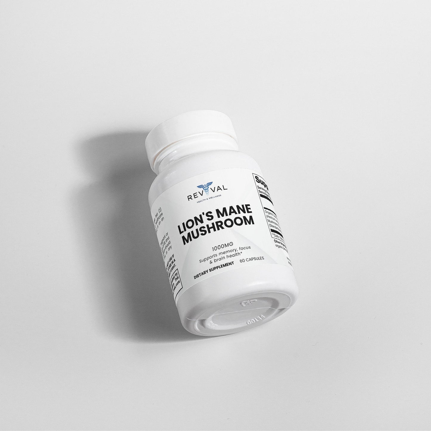 Supplement bottle labeled 'Lion's Mane Mushroom' by Revival on a light gray background
