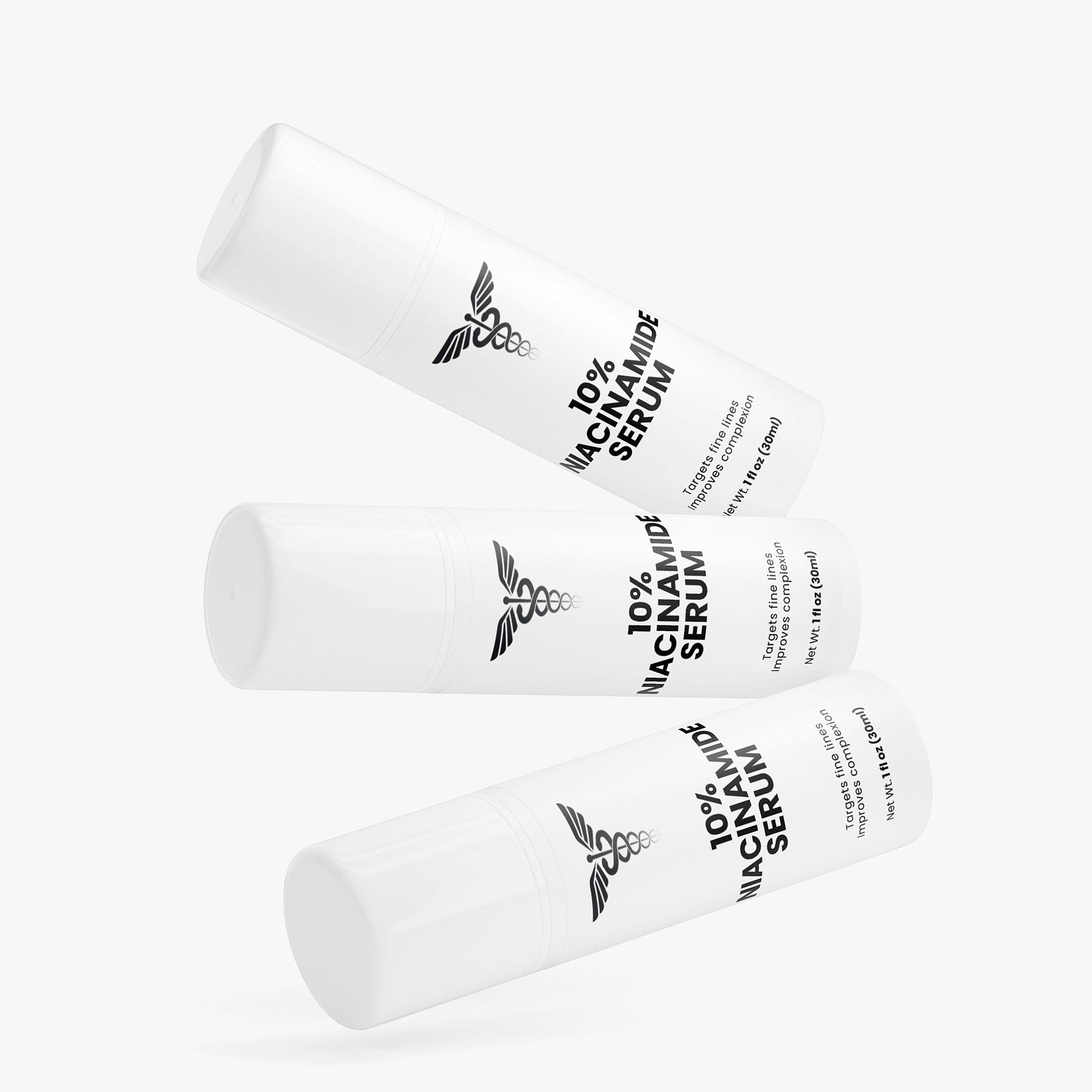 Three white cylindrical containers of 10% Niacinamide Serum on a white background
