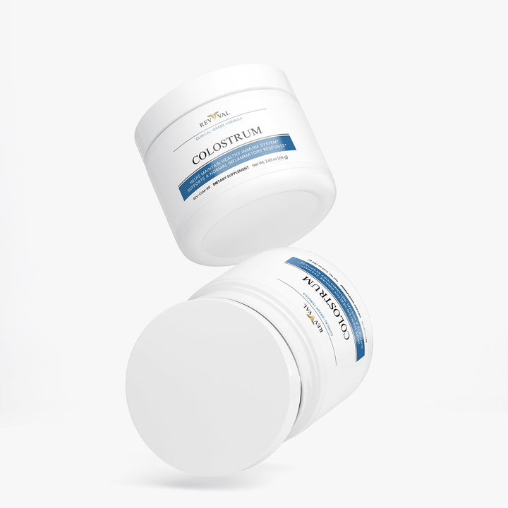 Two containers of Colostrum on a white background