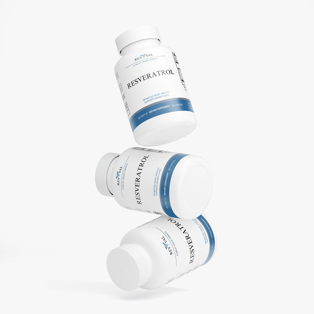 Three bottles of Resveratrol supplements on a white background