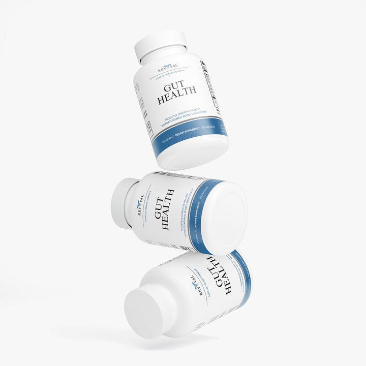 Three bottles of Gut Health supplements on a white background