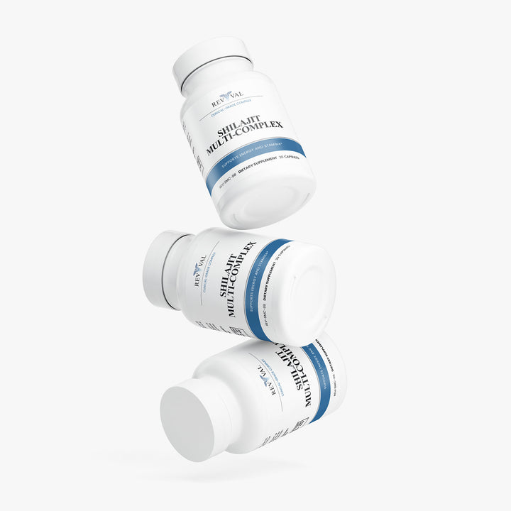 Three white supplement bottles with blue labels on a white background