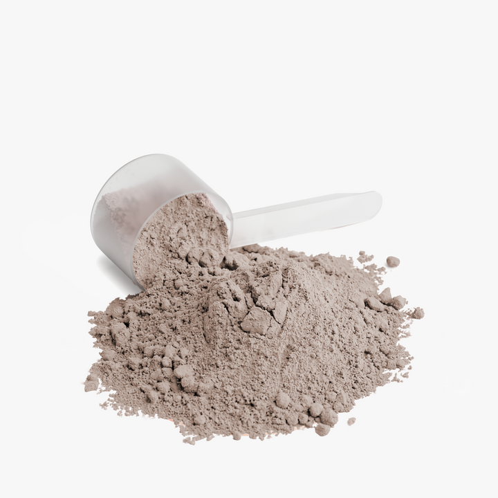 White scoop with protein powder on a white background