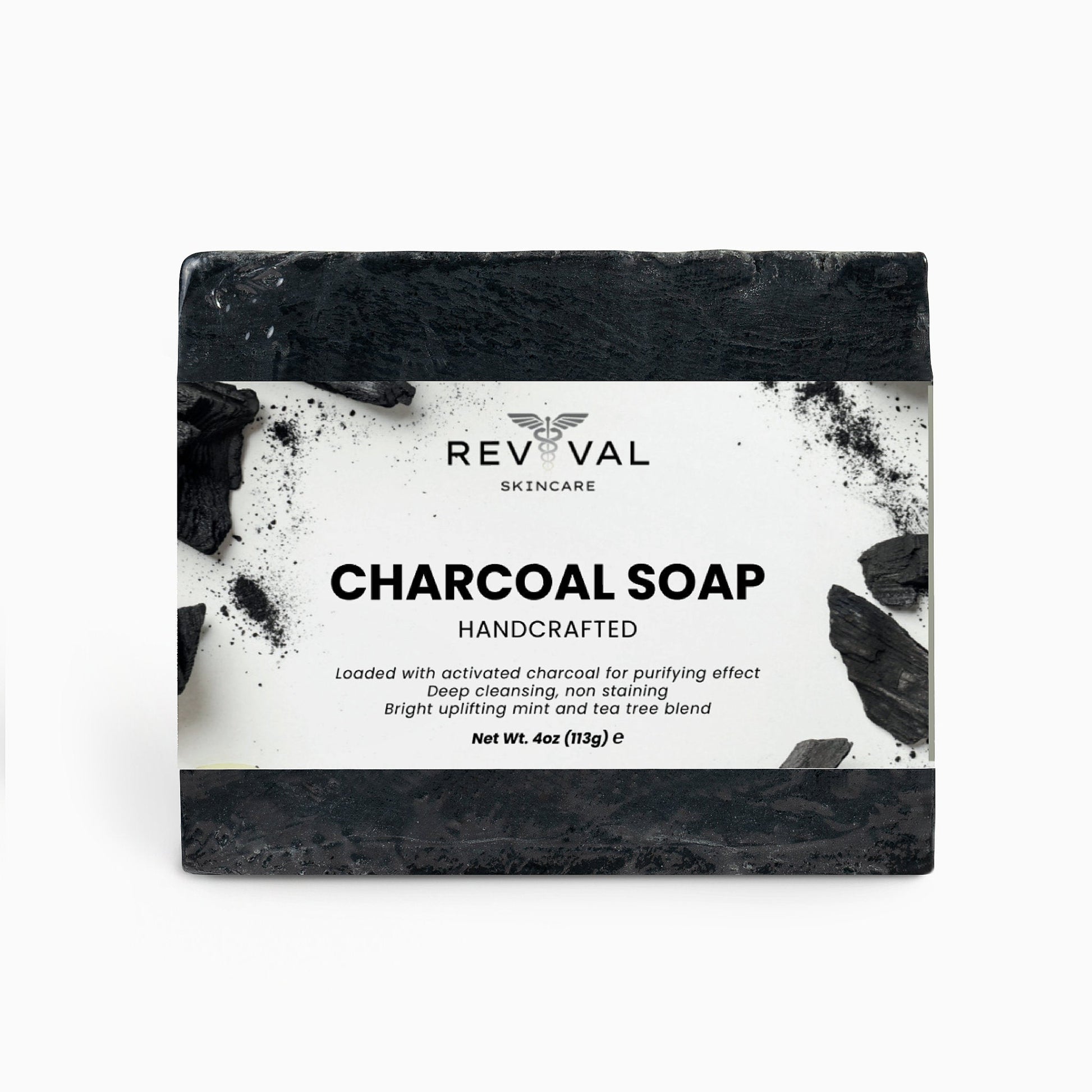 Revival Skincare charcoal soap bar on a white background