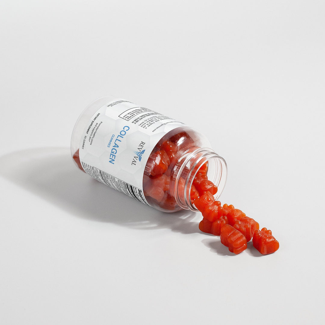 Bottle of collagen gummies spilling out onto a light gray background