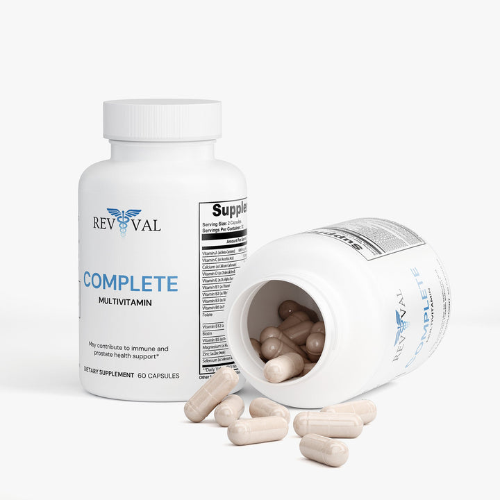Revival Complete Multivitamin bottle with open cap showing capsules on a white background
