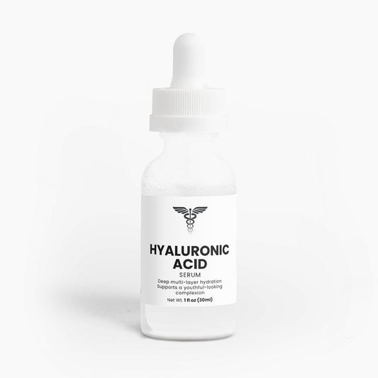 Bottle of hyaluronic acid serum on a white background